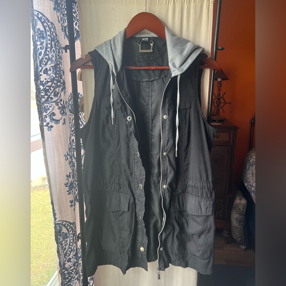 Black vest with grey hood